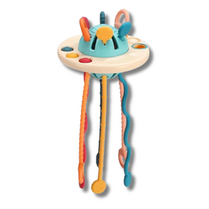 Ein Spielzeug nach dem Montessori Prinzip mit welchem das Baby oder Kind Greifen und Ziehen lernen kann.